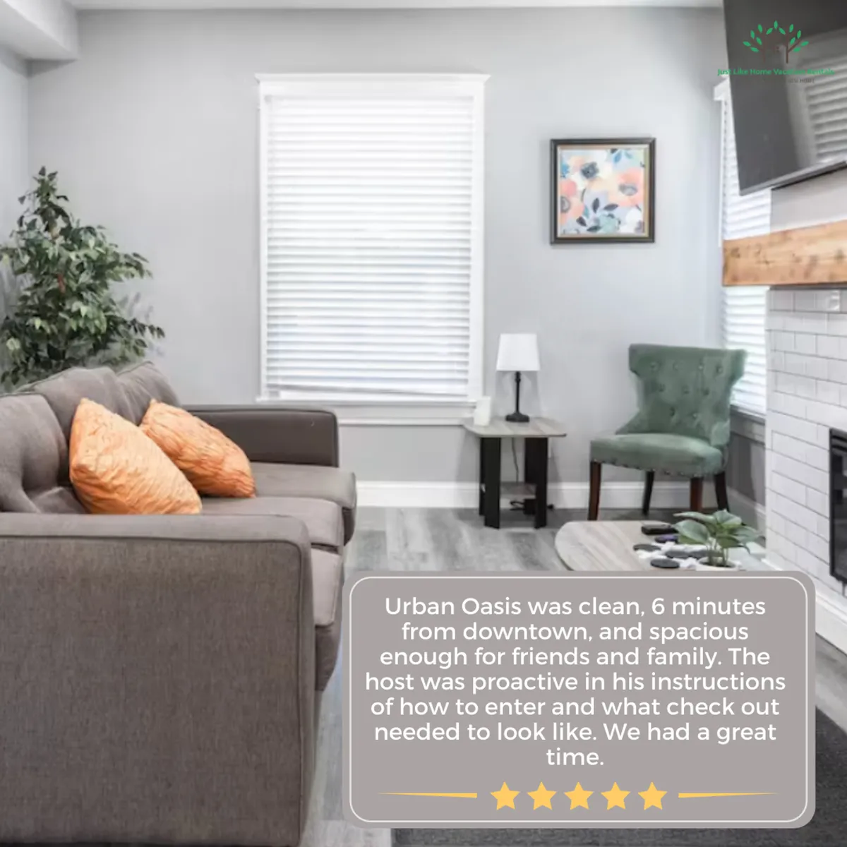 A charming living space featuring a sofa with orange pillows, a green chair, a small side table, and vibrant wall art. The natural light and comfortable furnishings create a warm and welcoming setting ideal for relaxing or socializing.